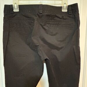 Tops are size Medium or Large. Pants and jeans are sizes 8-12.